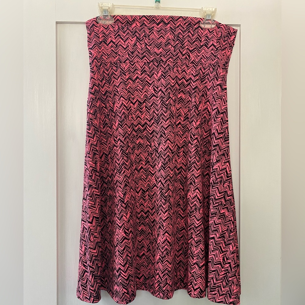 Fun and flirty but still works well for the office!  This is a mid-length dream!